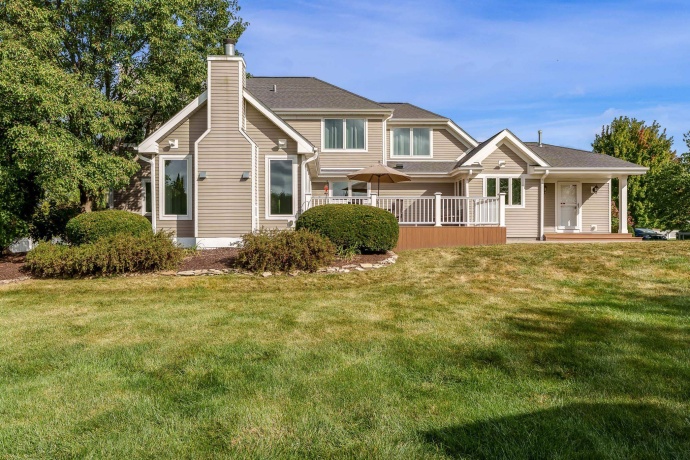 Sunroom left, kitchen mid