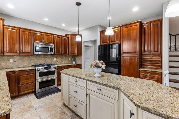 941 TIVOLI, ROCKFORD, Illinois 61107, 5 Bedrooms Bedrooms, ,4 BathroomsBathrooms,House,For Sale,TIVOLI,202602002