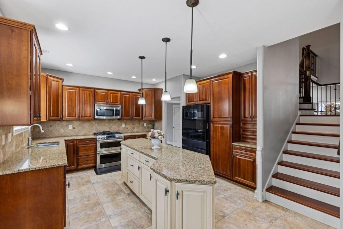 941 TIVOLI, ROCKFORD, Illinois 61107, 5 Bedrooms Bedrooms, ,4 BathroomsBathrooms,House,For Sale,TIVOLI,202602002