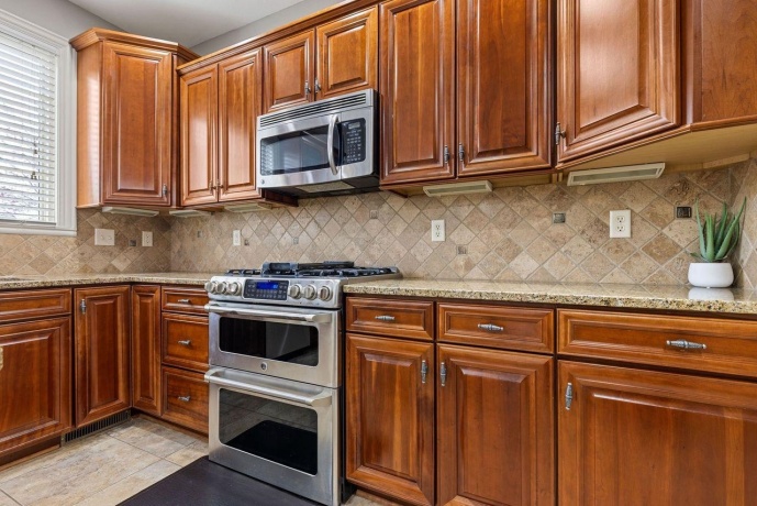 941 TIVOLI, ROCKFORD, Illinois 61107, 5 Bedrooms Bedrooms, ,4 BathroomsBathrooms,House,For Sale,TIVOLI,202602002