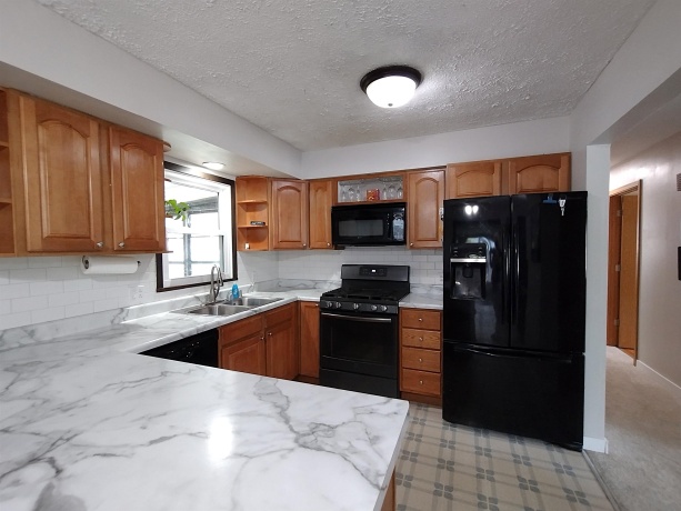 2321 Devon, LOVES PARK, Illinois 61111, 3 Bedrooms Bedrooms, ,2 BathroomsBathrooms,House,For Sale,Devon,202603132