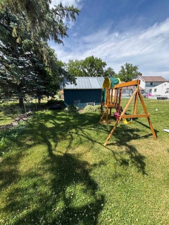 Fenced in! Playset Stays!